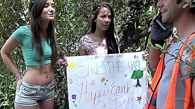 Three bronzed babes in skimpy shorts take turns sucking and fucking each other's hot spots