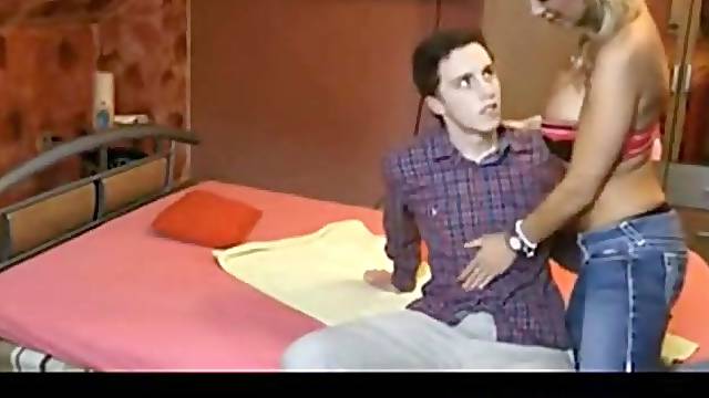 Prostitute goes down on dude and sucks him like a real champ.