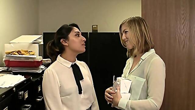 Nasty nymphomaniacs Nina and Ella expose their secret lust in an erotic office rendezvous