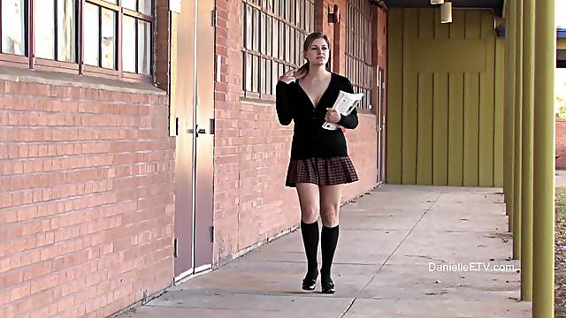 Outdoors solo video of naughty Danielle flashing her large boobs